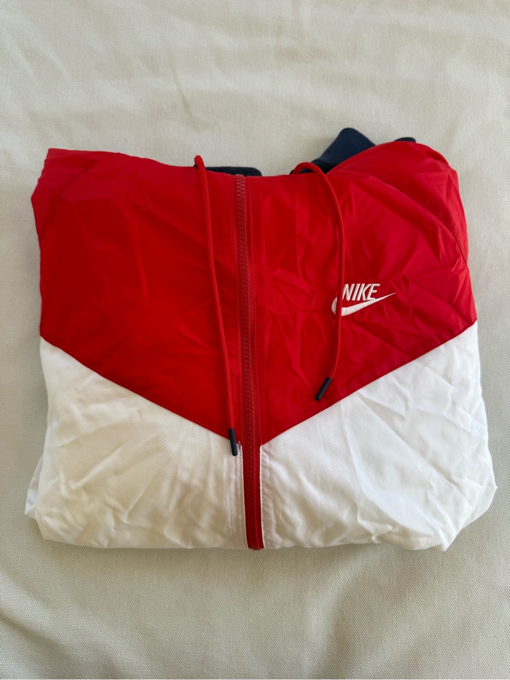 Nike Menās Red, White, and Blue Colorblock Windbreaker